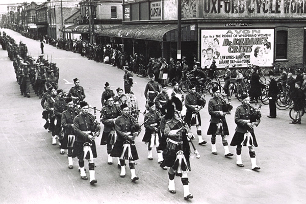 St Andrew's College Pipe Band in 1942 piping the troops off to war.