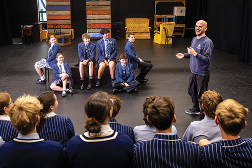 St Andrew's College Head of Drama and Dance, Laurence Wiseman, with a Drama class at the Blair Gough Drama Studio.