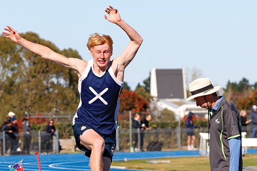 St Andrew's College student Beau Robertson competing in long jump at the South Island Athletics Championships.