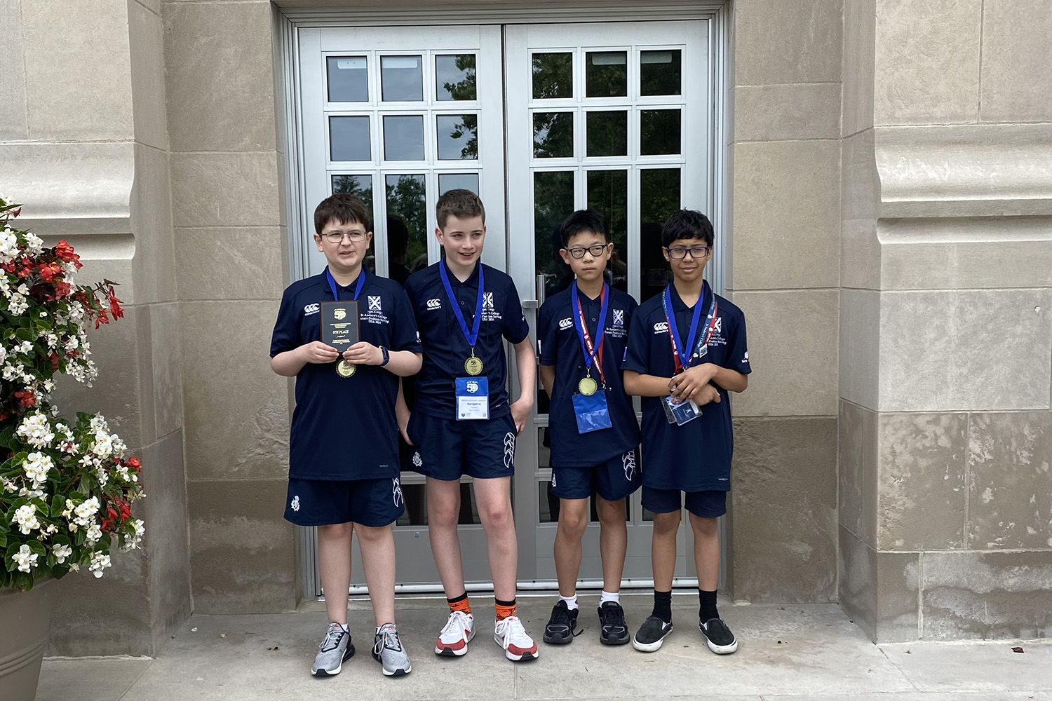 St Andrew's College Year 8 students Louie Hyland, Benjamin Edward Cong (Zilong) Chen and Emmett Lawler with their Future Problem Solving medals.