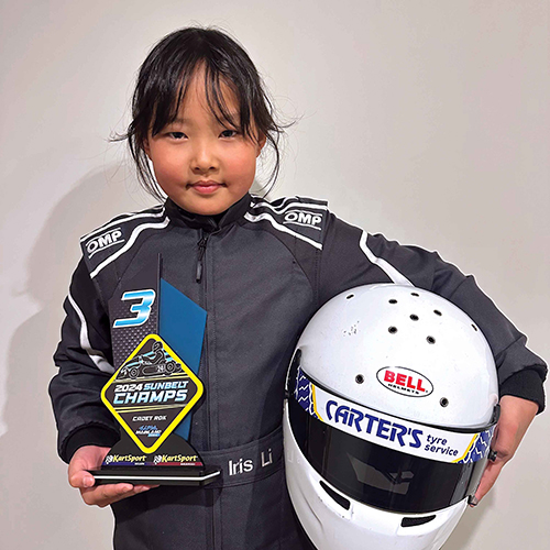 St Andrew's College student Iris Li after winning the third-place trophy in the Cadet Rok class at the Central New Zealand Sunbelt Kartsport Championships.