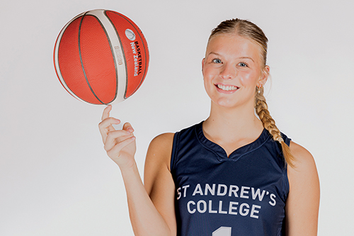 St Andrew's College student Ophelia Powell with a basketball.