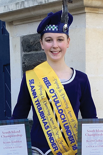 St Andrew's College student Siara Clark with her Highland Dance awards.