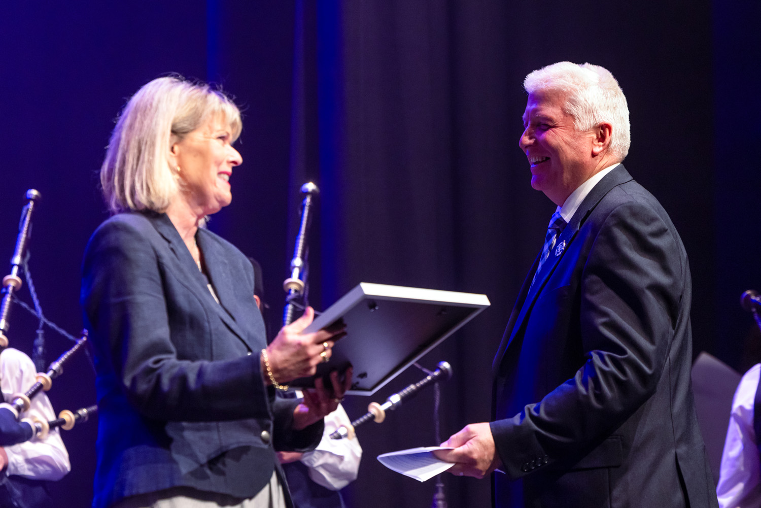 St Andrew's College Rector Christine Leighton and Pipe Band Director Richard Hawke at StAC Attack 2024.