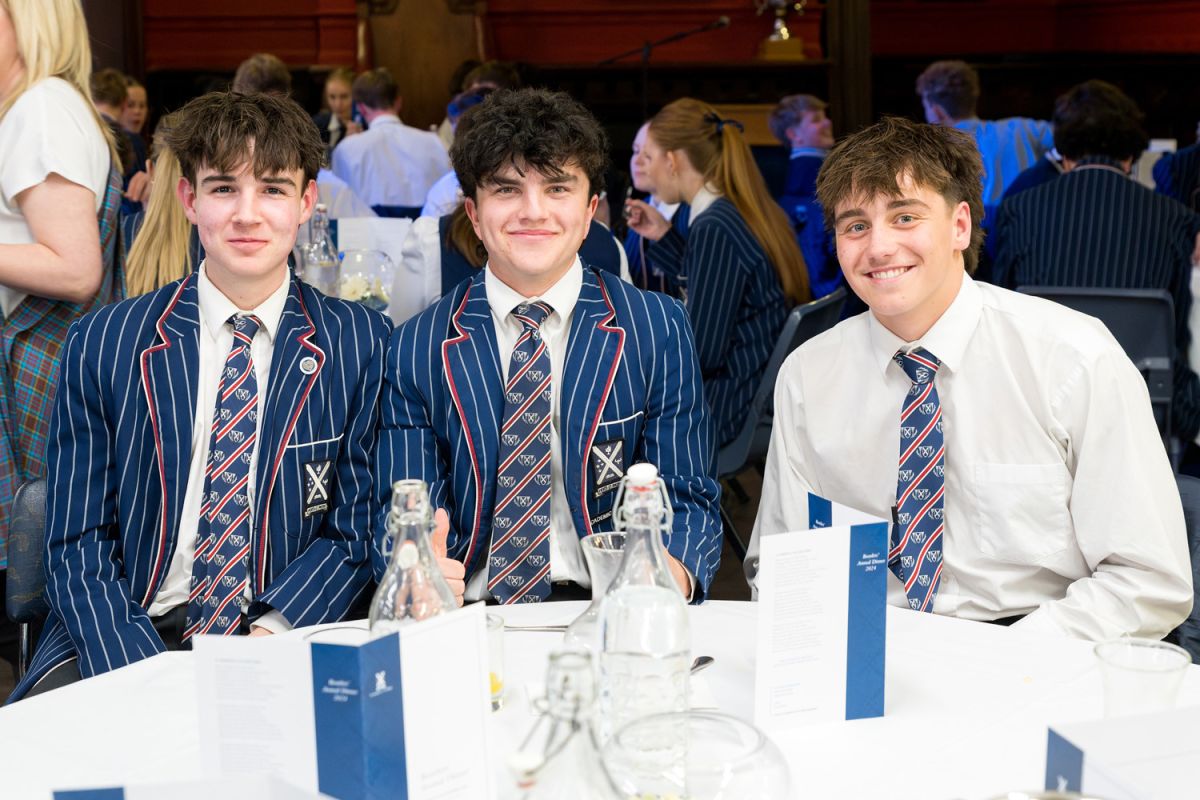 Three St Andrew's College students at the 2024 boarders' annual dinner.