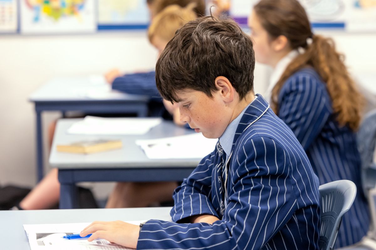 St Andrew's College student sitting for an exam.