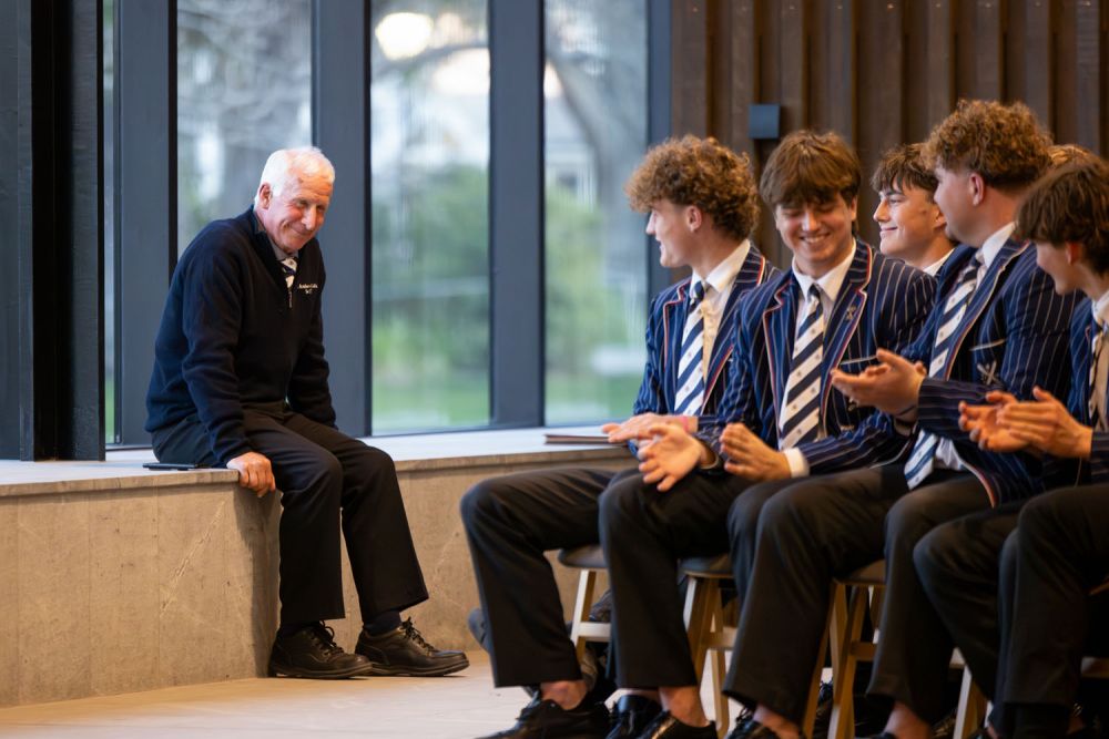 St Andrew's College Sports and Activities Coach, Mike Johnston, and rugby players at the 2023 Rugby Prizegiving