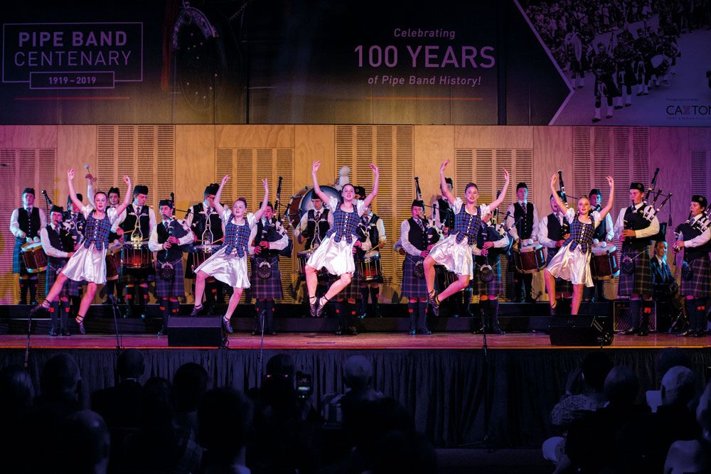 St Andrew's College Pipe Band and Highland dancers during concert.