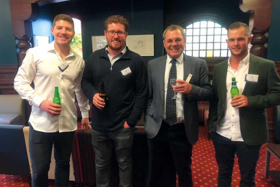 Three Old Collegians with Teacher, Ian White (second from right)