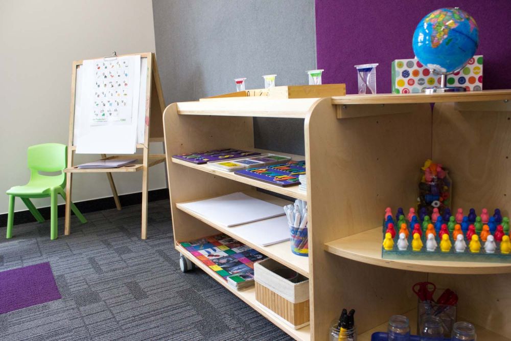 Pre-school shelving with activities on the shelving unit