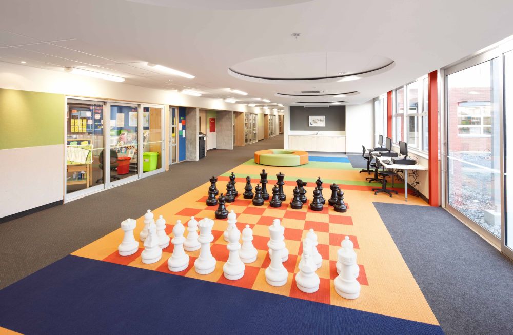 Preparatory School shared space outside of classrooms with chess pieces