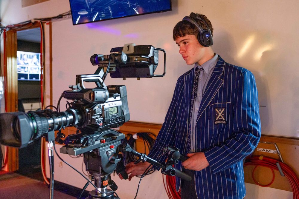 TV studio camera with student operator