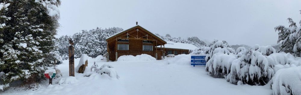 Castle Hill lodge exterior in the snow
