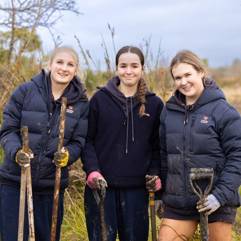 A group of students planting trees in the Christchurch redzone.