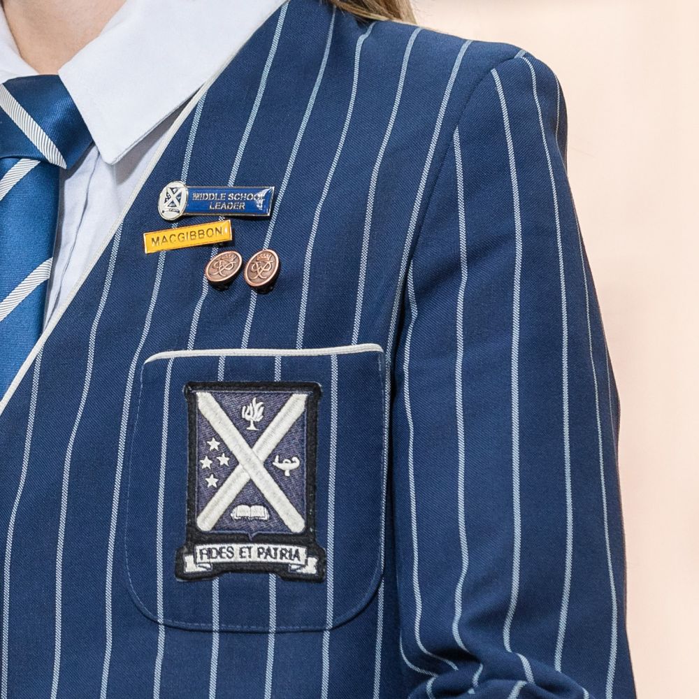Close up of a students blazer.