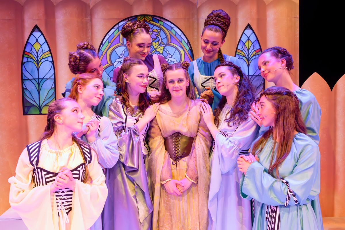 Ten St Andrew's College Middle School female students performing at Once Upon a Mattress.