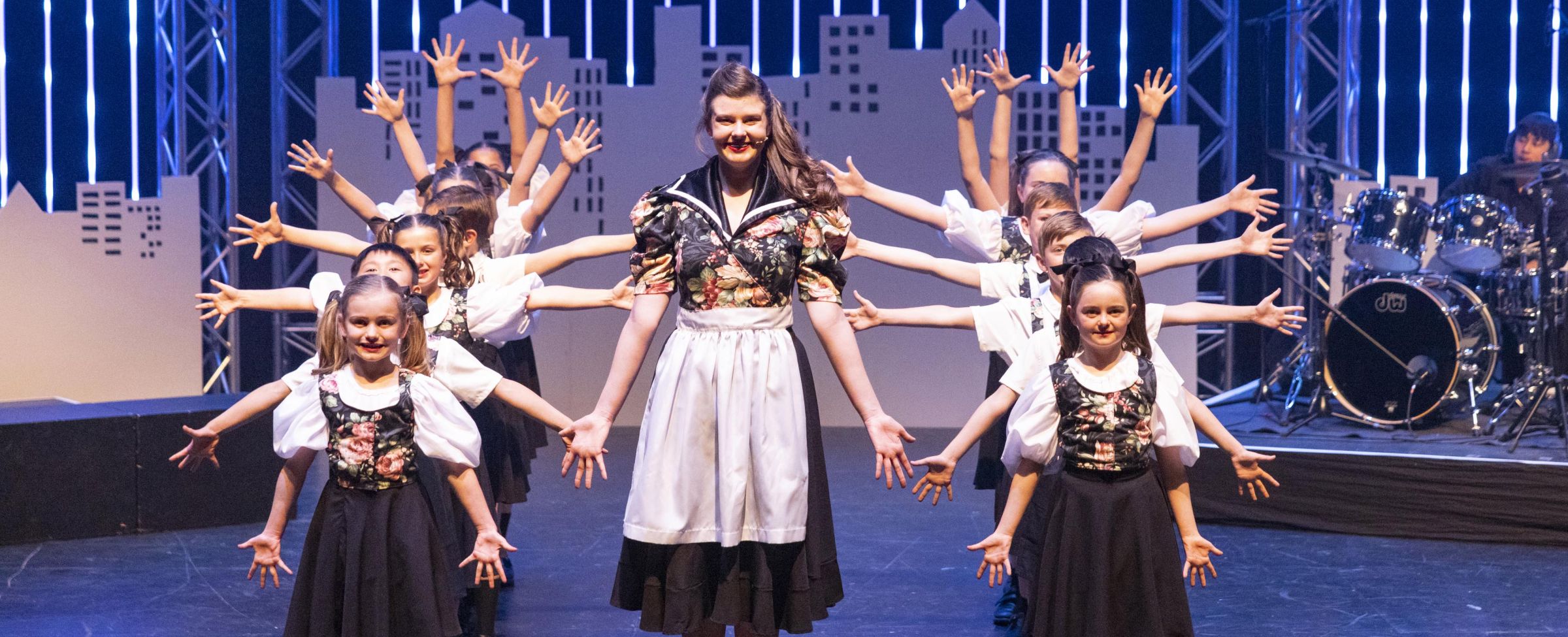 Students performing Sound of Music item on stage
