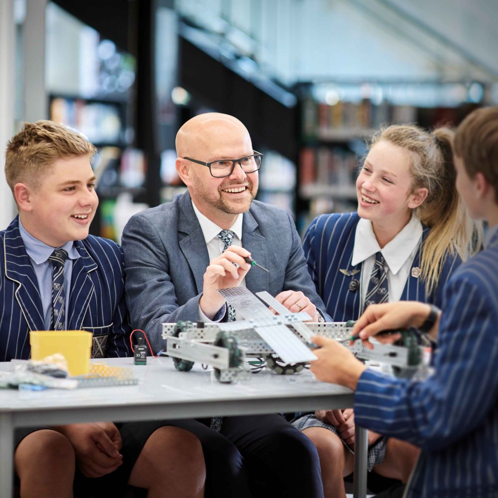 St Andrew's College teacher Wilj Dekkers with students.