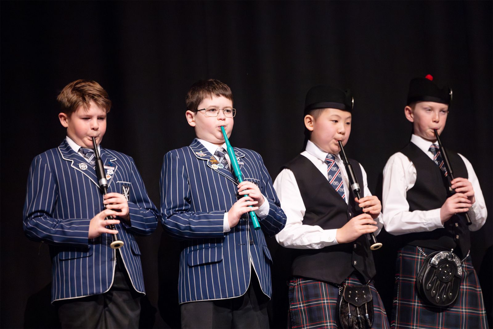 Preparatory student pipers performing at StAC Attack.