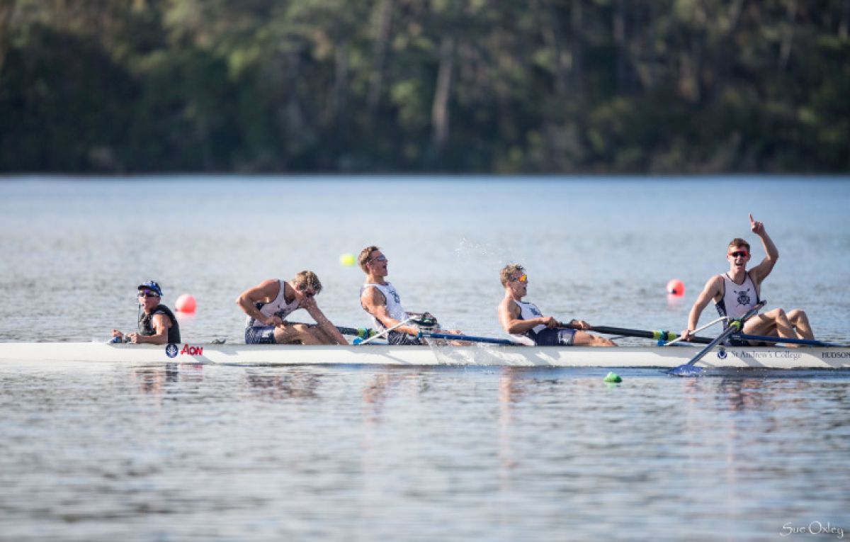 Rowers at the end of a race celebrating