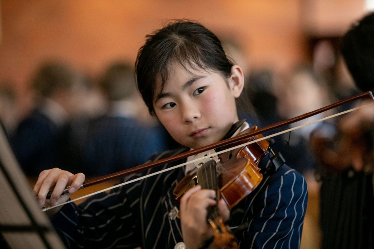 StAC student playing violin