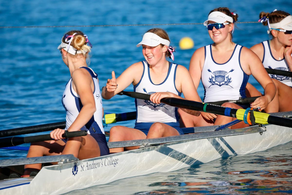 Four St Andrew's students rowing.